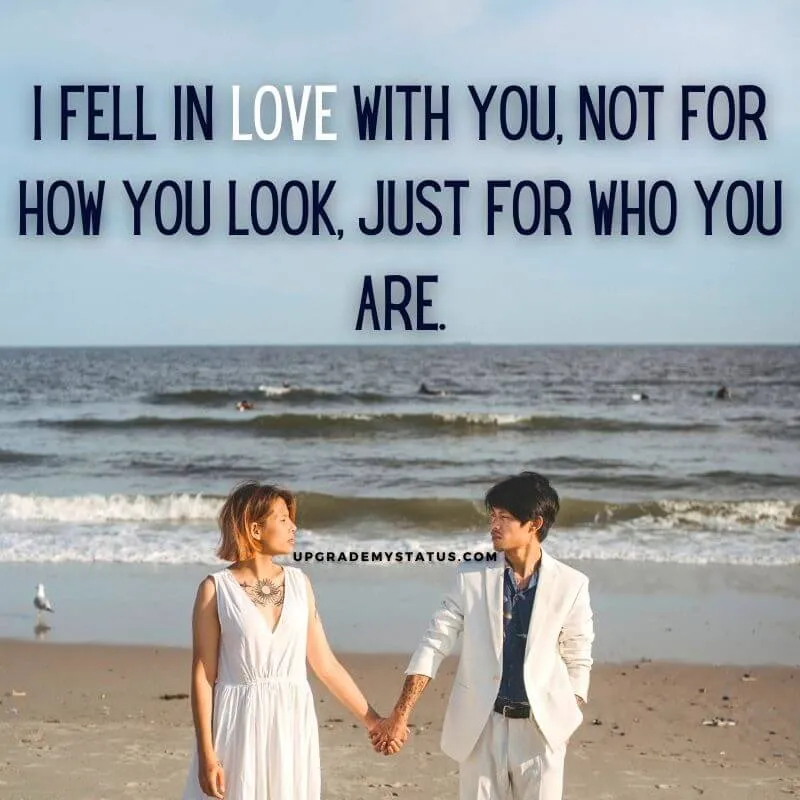 a girl and boy wearing white dresses walking holding hands on a beach over it real love status in english is written