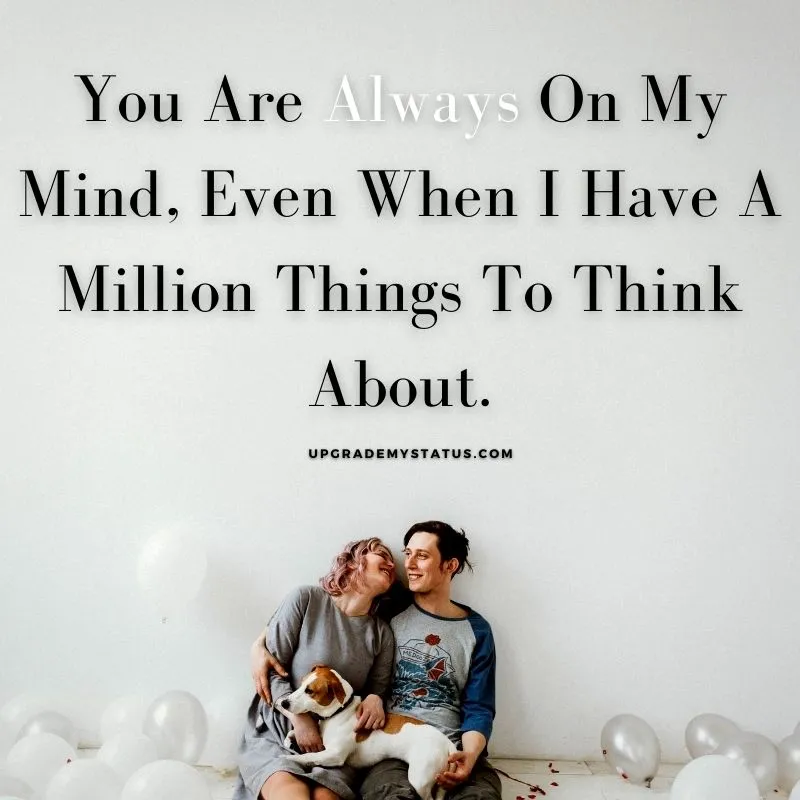 a girl and boy sitting in a room full of balloons with romantic status for WhatsApp written on it. 